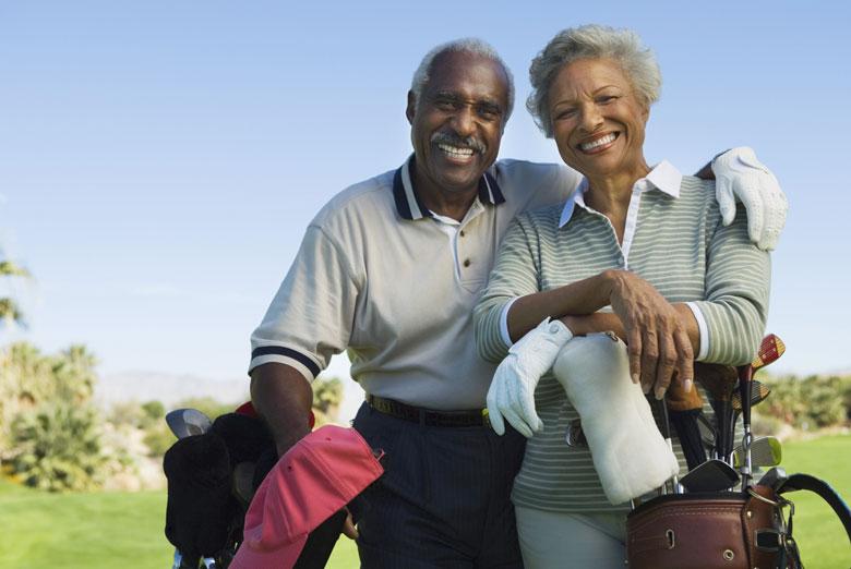 Older Couple Playing Golf